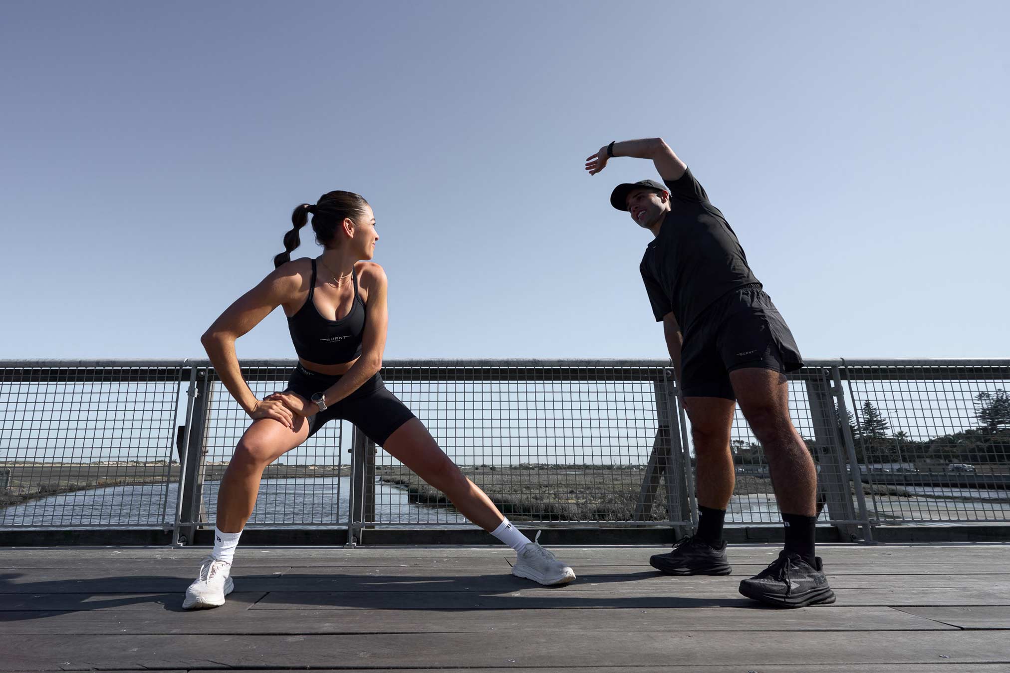 Nic Acampora and Burnt Studios founder Andriana Cronje, warming up for the Zero to 10k running program.