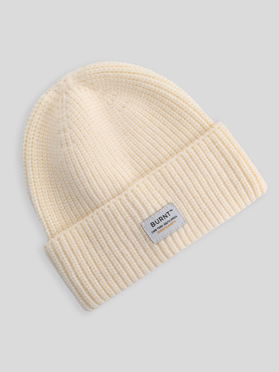 Moscow Beanie in cream - front view
