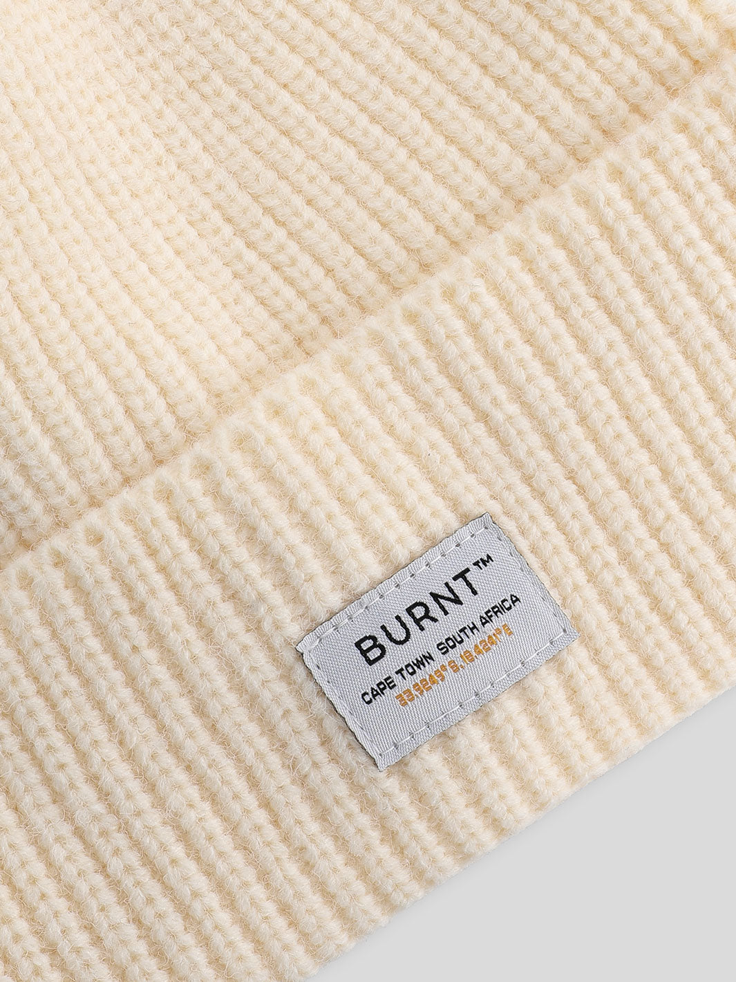 Moscow Beanie in cream - close view