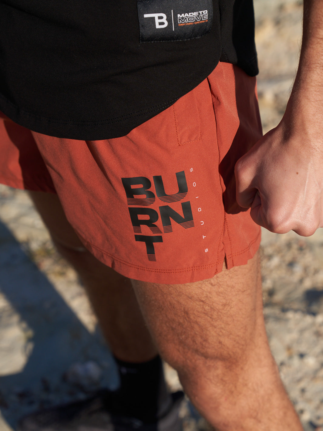 Burnt Studios Activewear 5-inch shorts in core rust social