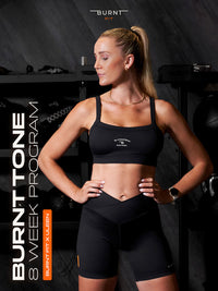 Cover of Burnt Tone 8-week women’s gym program featuring Uleen Fourie with a focus on strength training.